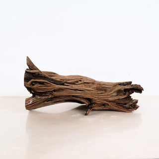Manzanita Driftwood piece with natural twisted textures, ideal for aquarium or terrarium decoration, measuring 19 by 7 by 7 inches